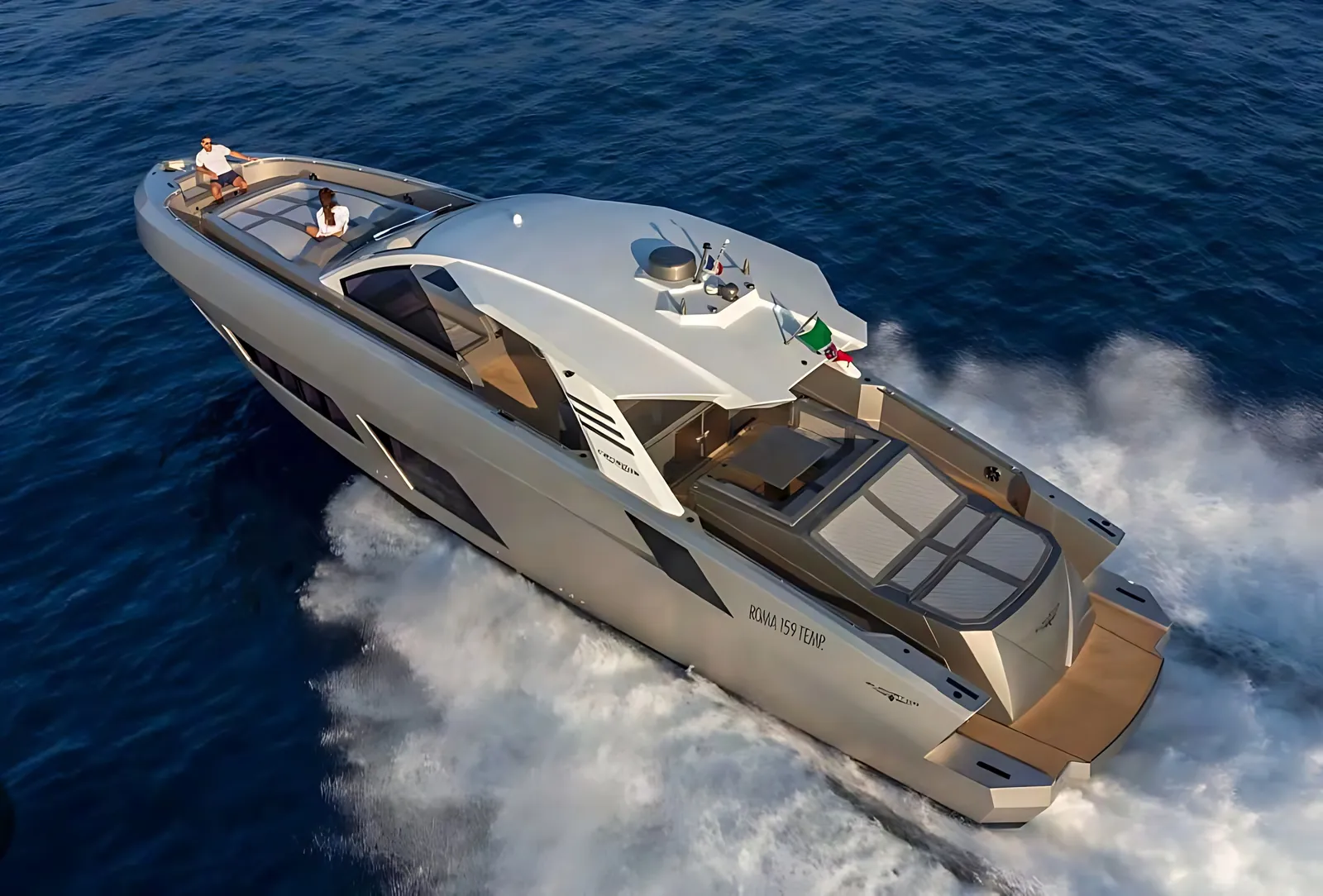 Canados 63 sport yacht running at speed, aerial view of her hardtop, sun pads and white wake