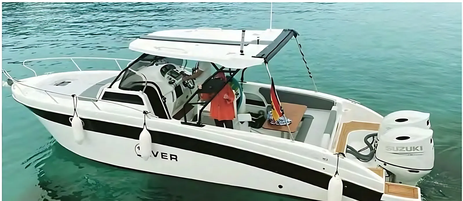 Saver 795 runabout at rest over clear green water, with a rigid top, side rails and outboard engines at the stern