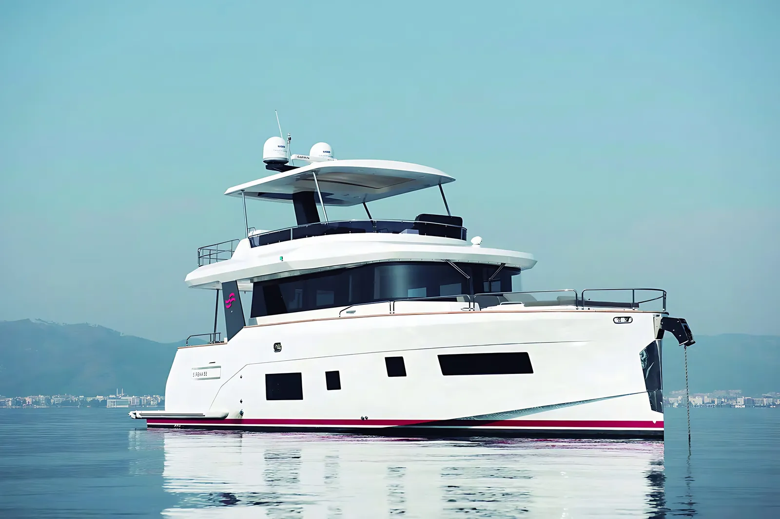 Sirena 58 at anchor on calm water, side view of her white hull, plumb bow, flybridge and hard top